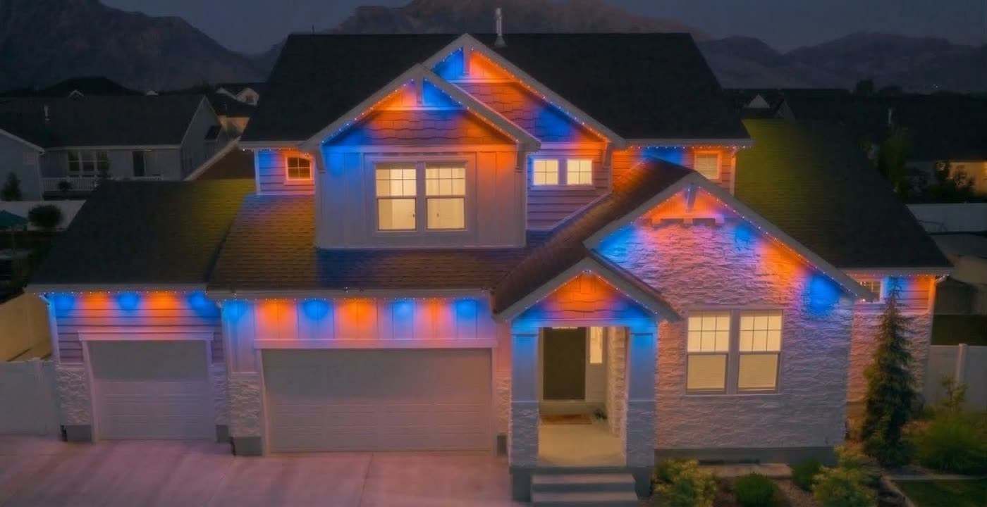Permanent lighting on the roofline of a home like those we install in Downs, Illinois